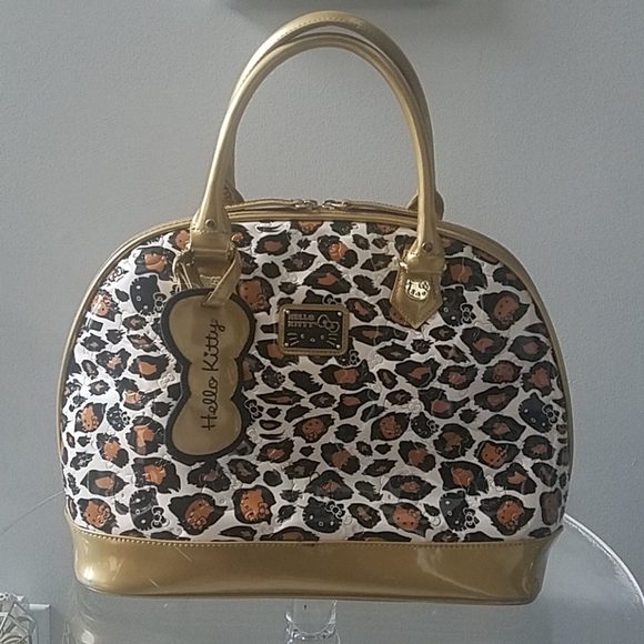 Hello Kitty Handbags - Hello Kitty Embossed Cheetah Bowling Bag